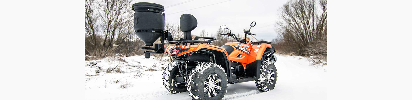 Lastrackmonterad spridare